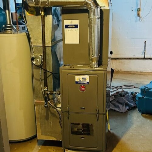 Rheem furnace installation with ductwork and water heater