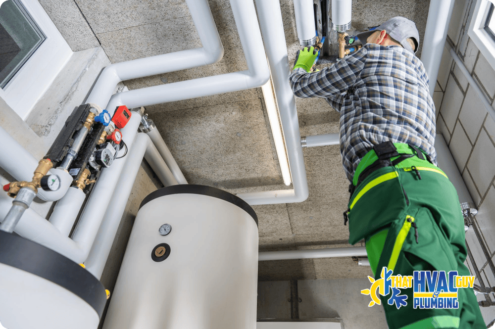 workers installing PVC pipes for a new drainage system